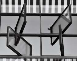The glass windows in the factory served as a natur The glass windows in the factory served as a natural air-conditioner and were also a source of natural light. The work that required keen eyesight was